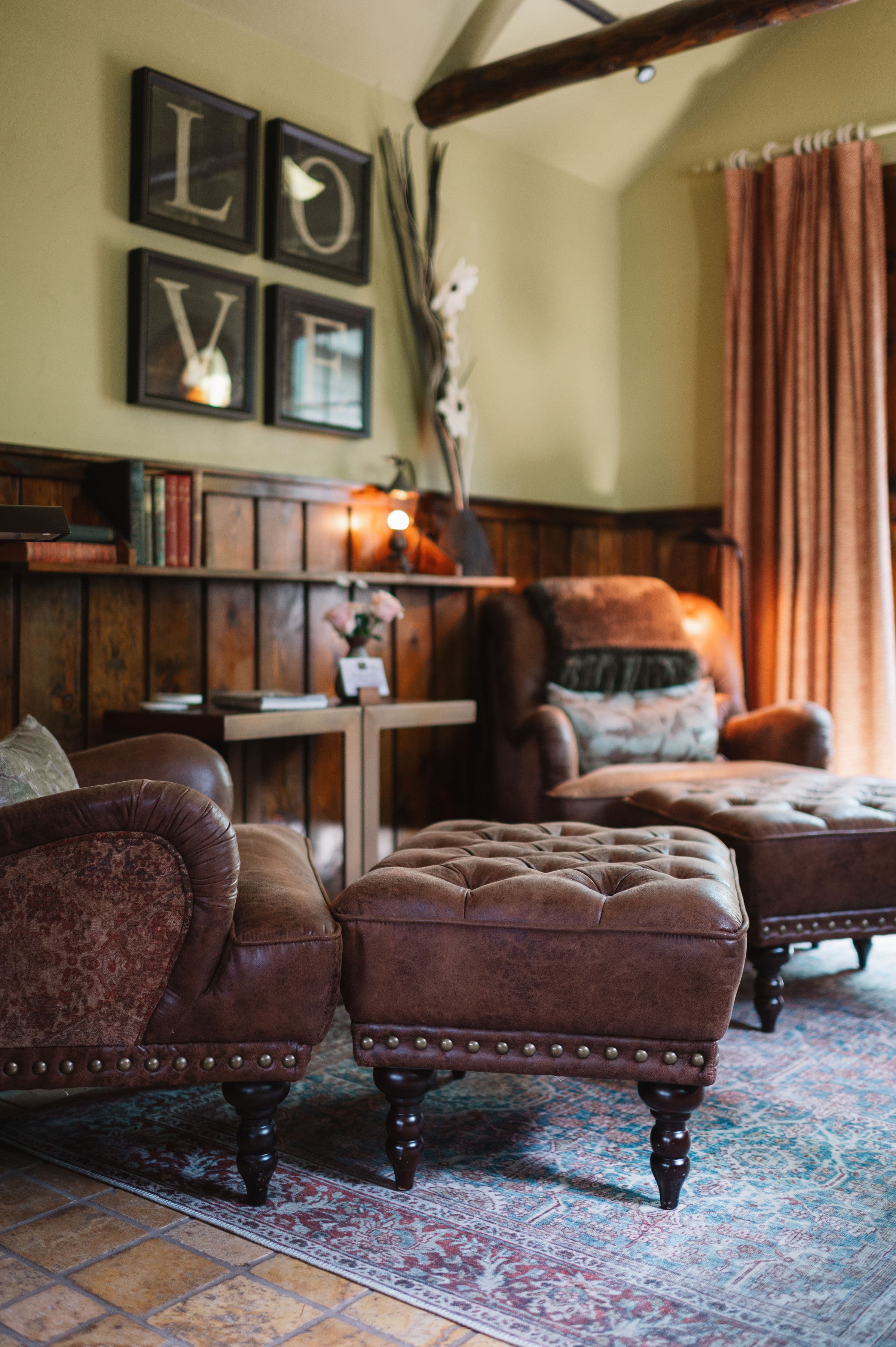 Cozy sitting area with leather chairs