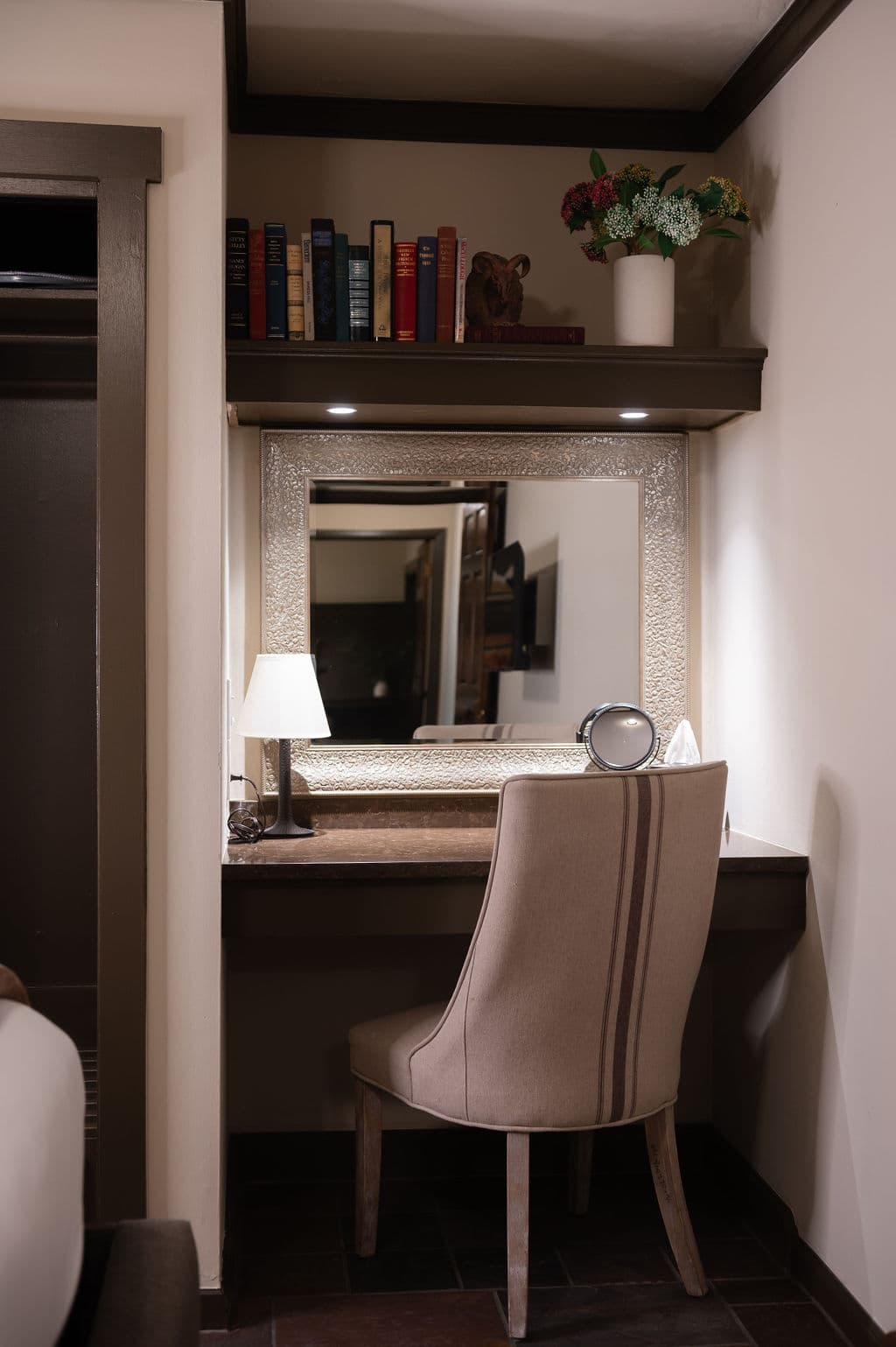 Vanity area off to side of king bed