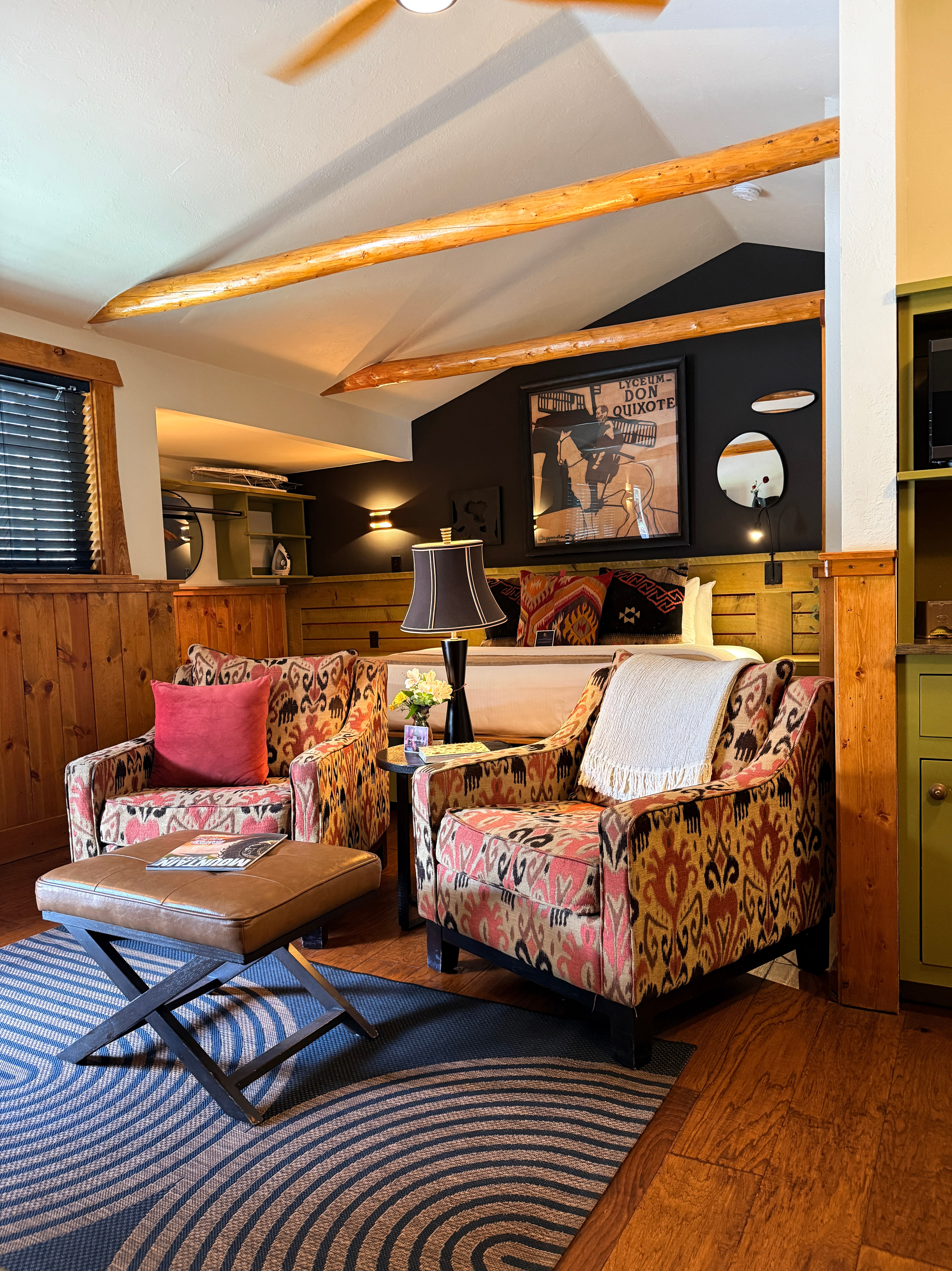 Art deco chairs, keurig coffee pot, wood timber beams