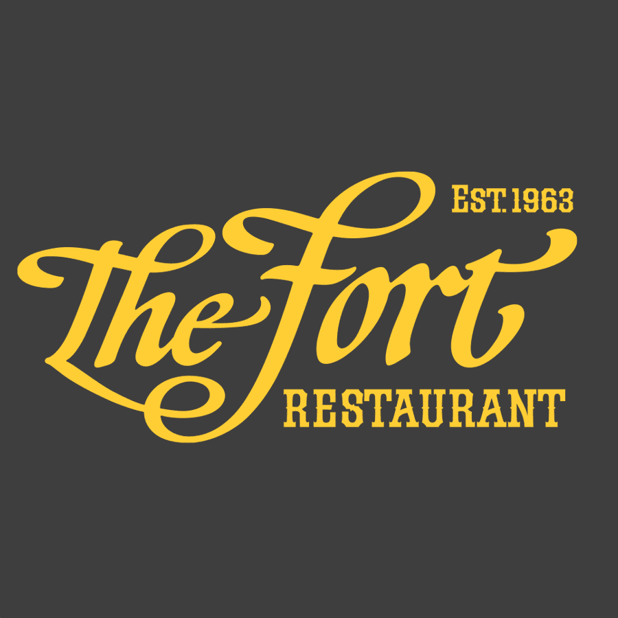 Logo of The Fort Restaurant, established in 1963, featuring bold yellow lettering on a dark background.